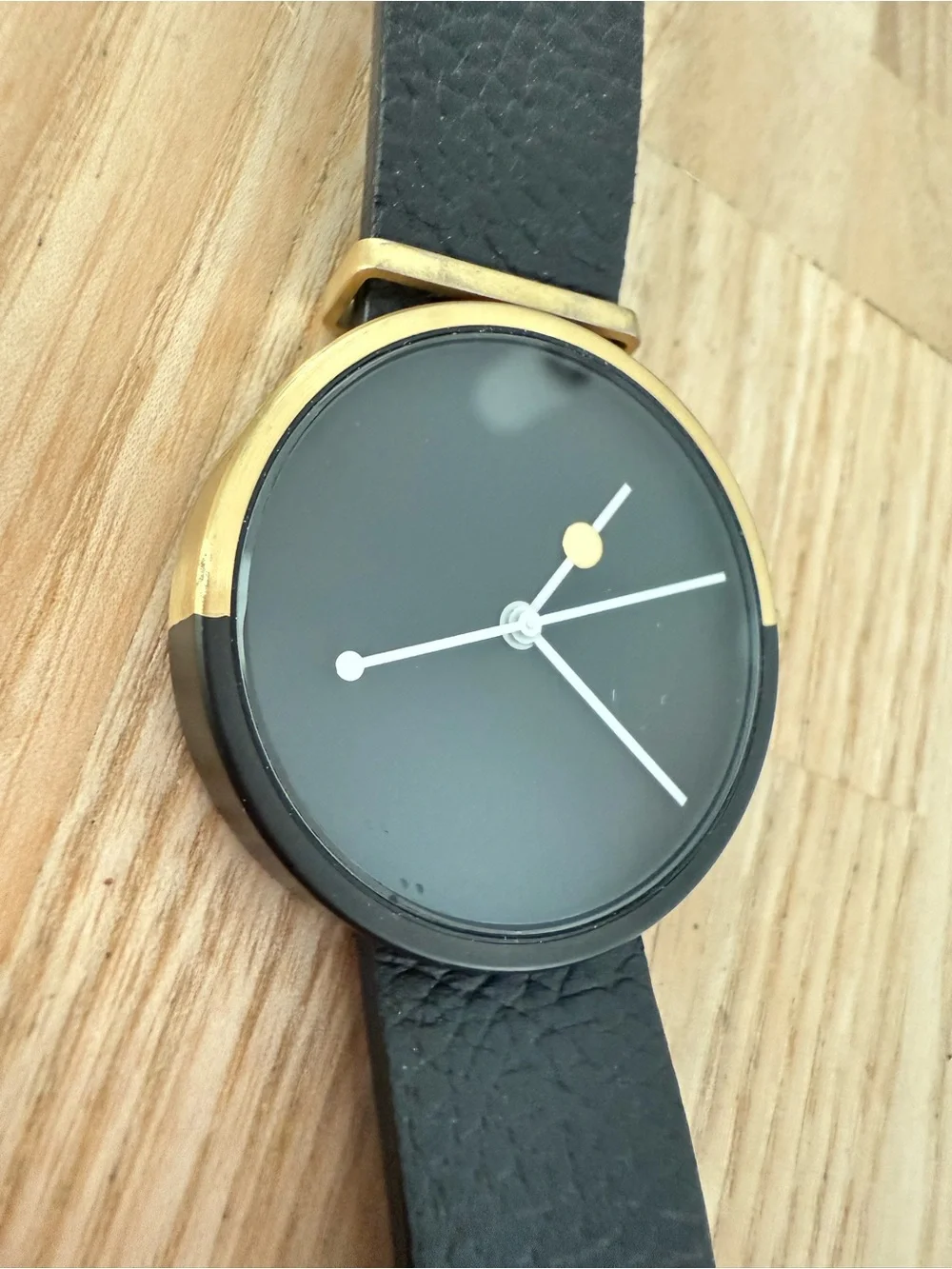 AARK eclipse gold tone and black leather minimalist watch NEW BATTERY